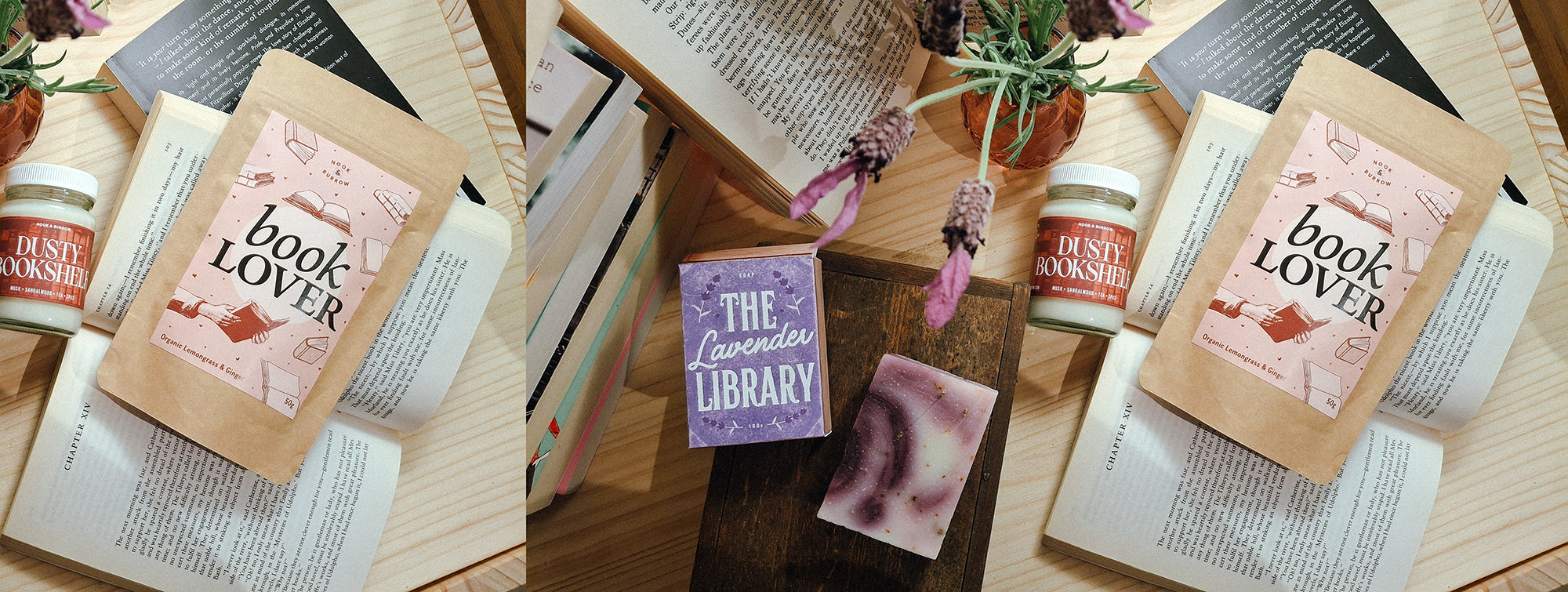 Close-up flatlay of the âBook Loverâ tea, 'Dusty Bookshelf' candle and âThe Lavender Libraryâ soap resting on the pages of several open books.