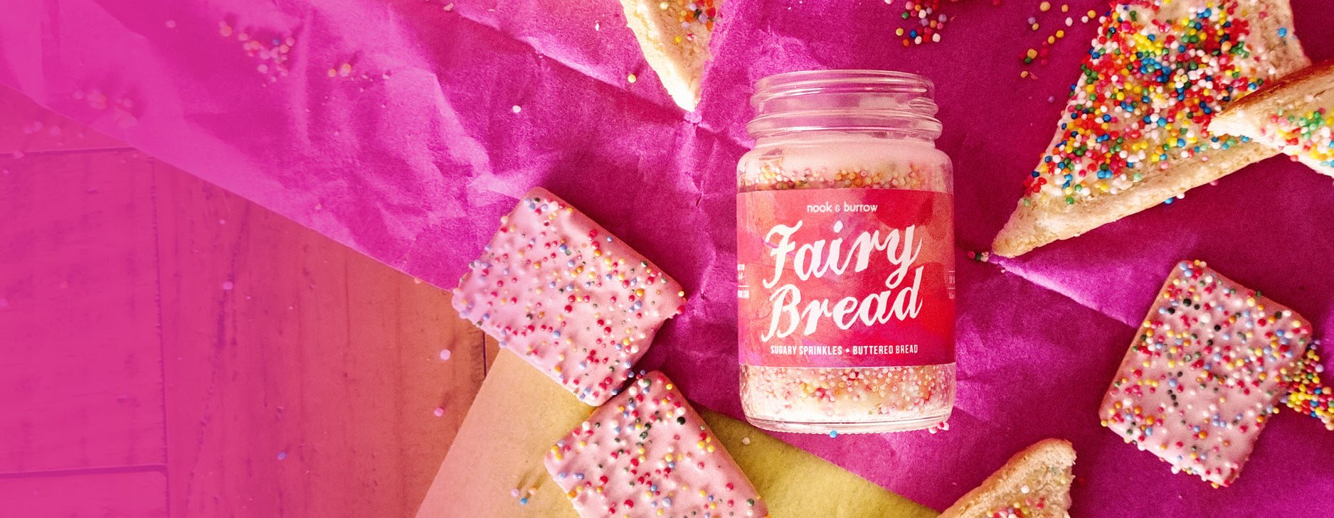 Fairy Bread Candle banner with pink background and sprinkles on buttered bread