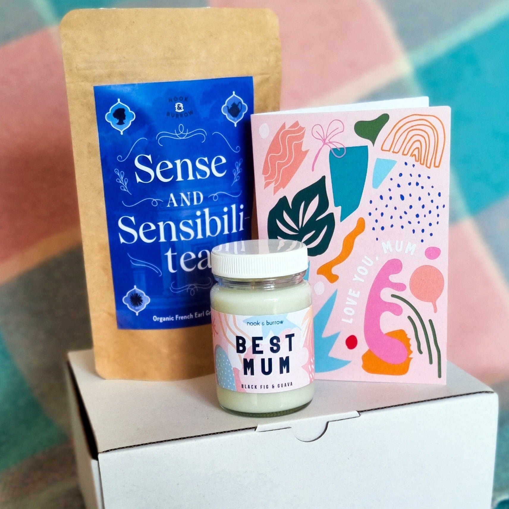 Best Mum Gift Box with a pack of loose leaf tea, tea strainer, best mum candle and designed greeting card that says 'Love you, Mum'